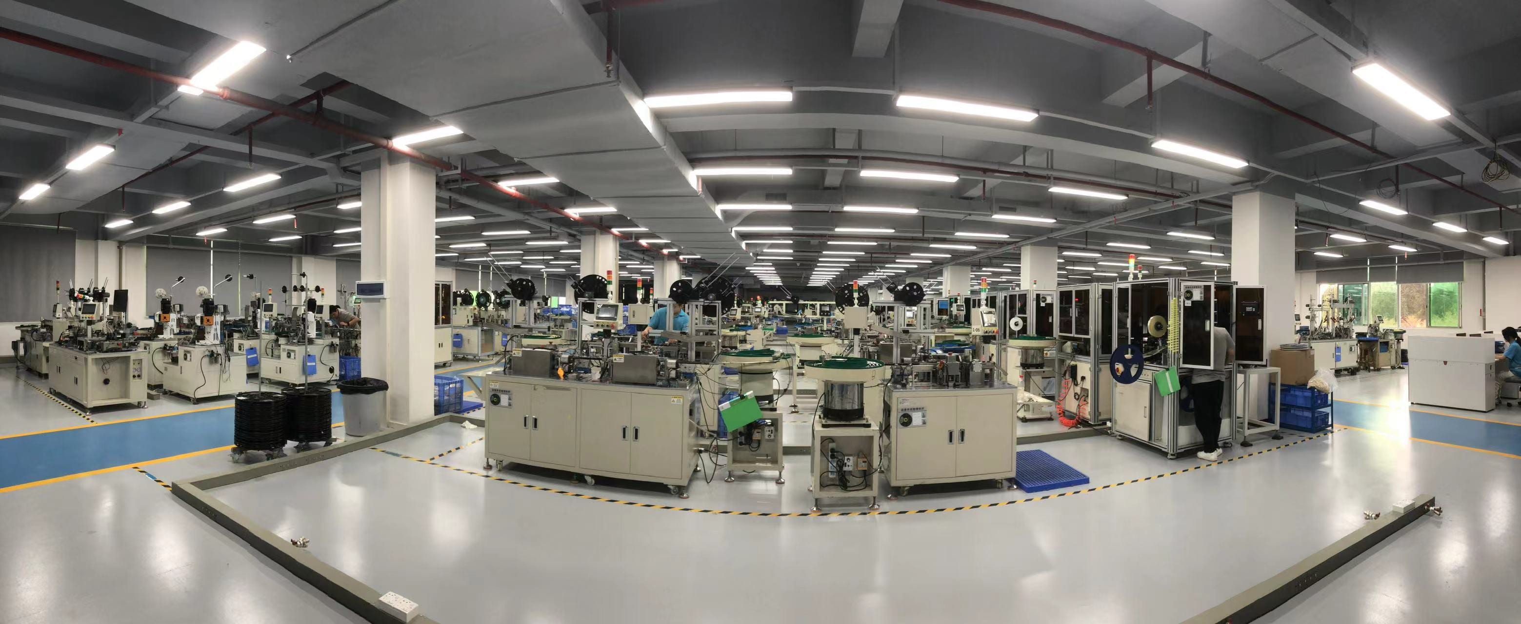 Konnra assembly and CCD inspection workshop: long rows of automated assembly machines under factory lighting